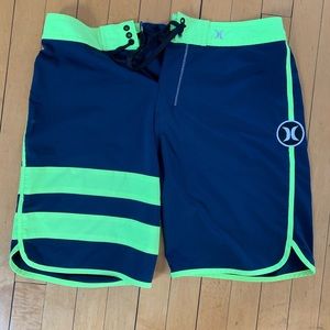 Hurley board shorts size 32. Blue and neon .